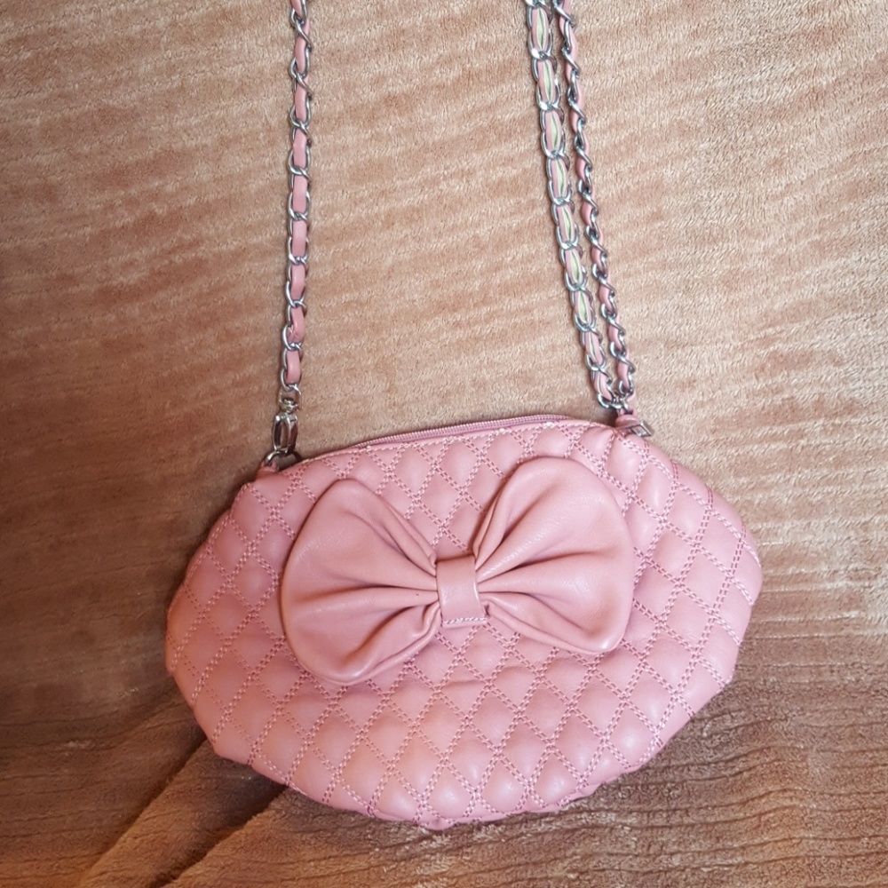 Pink faux leather quilted purse with chain